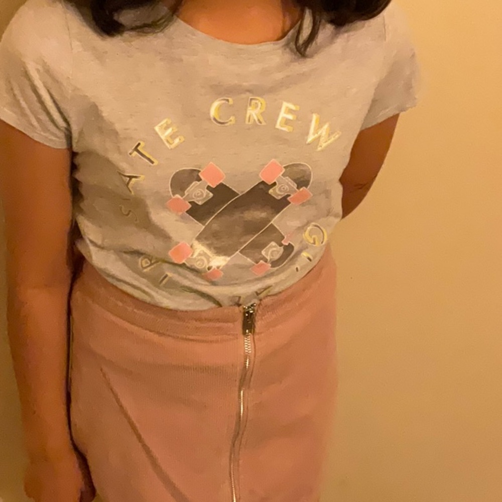 Grew shirt, pink skirt